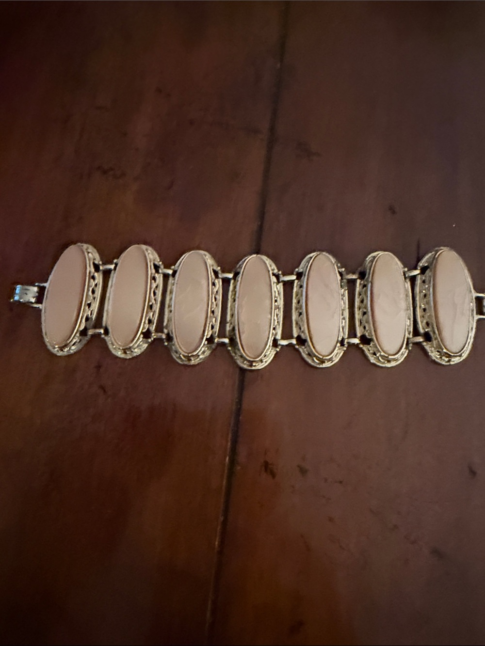 Elegant Gold-Tone Bracelet with Blush Pink Oval Inlays